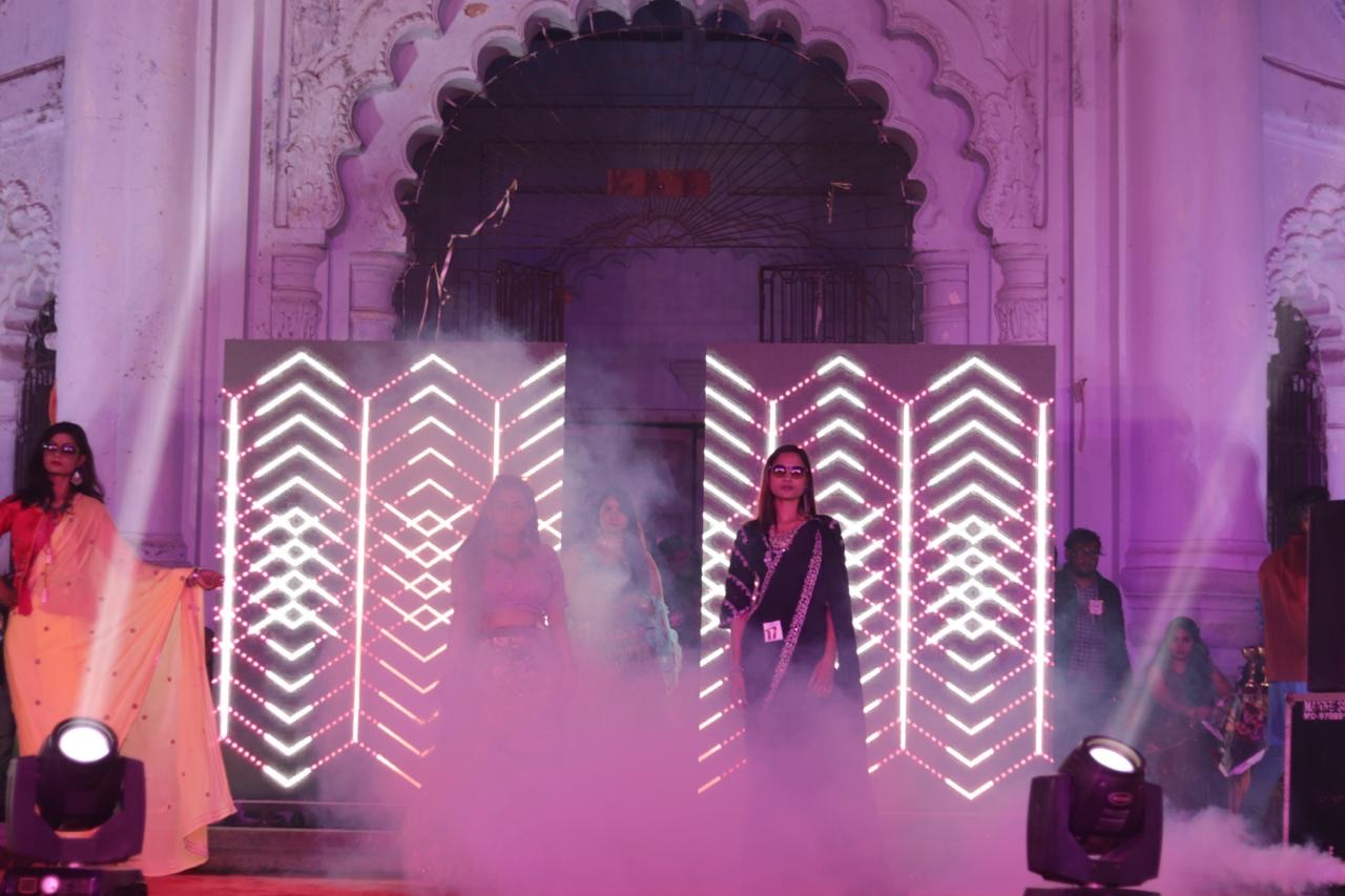 Runway model displaying high-end couture fashion